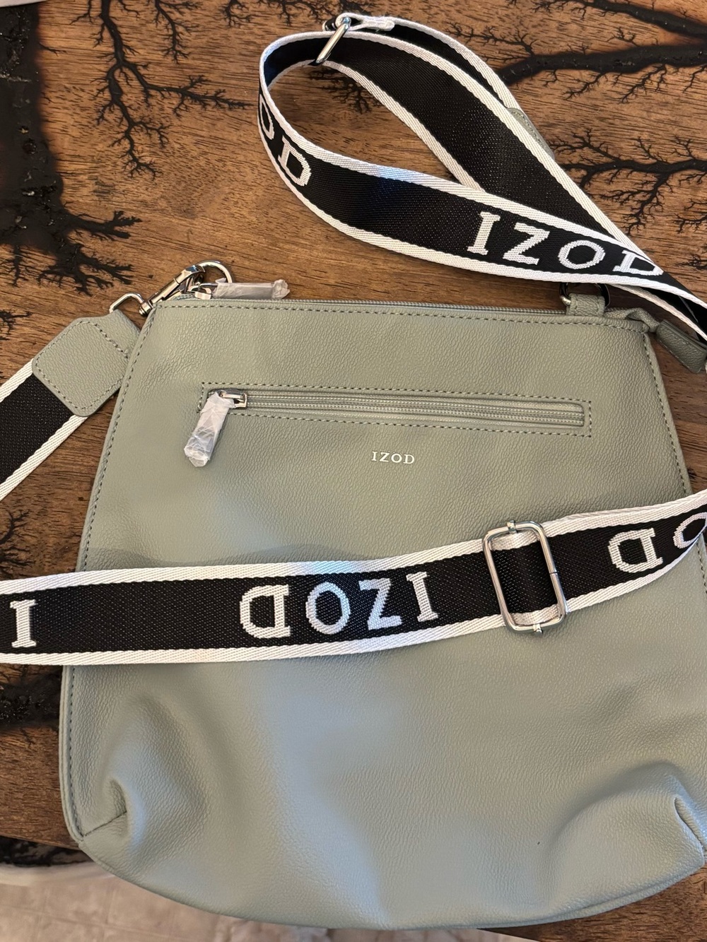 IZOD Sage Green Crossbody with Black and White Logo Strap